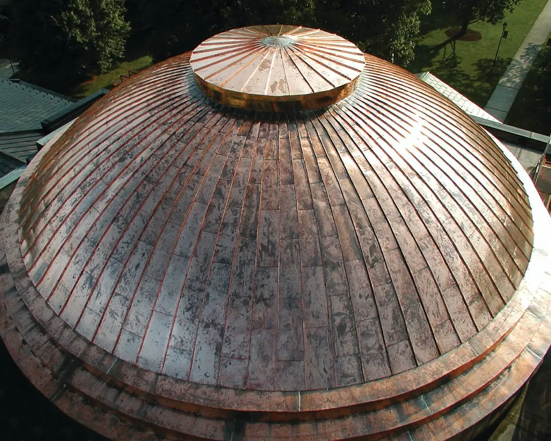 Craftsman Roofing crew installing a new roof in Westerly